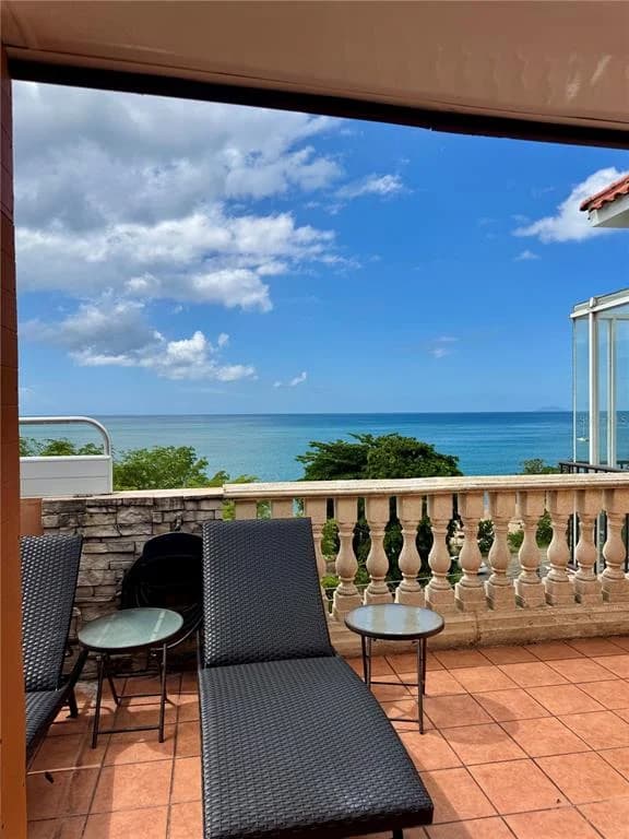 Exterior of Costa Ensenada · Unit 401 shown by Rivera Realty · Stellar MLS PR9117597