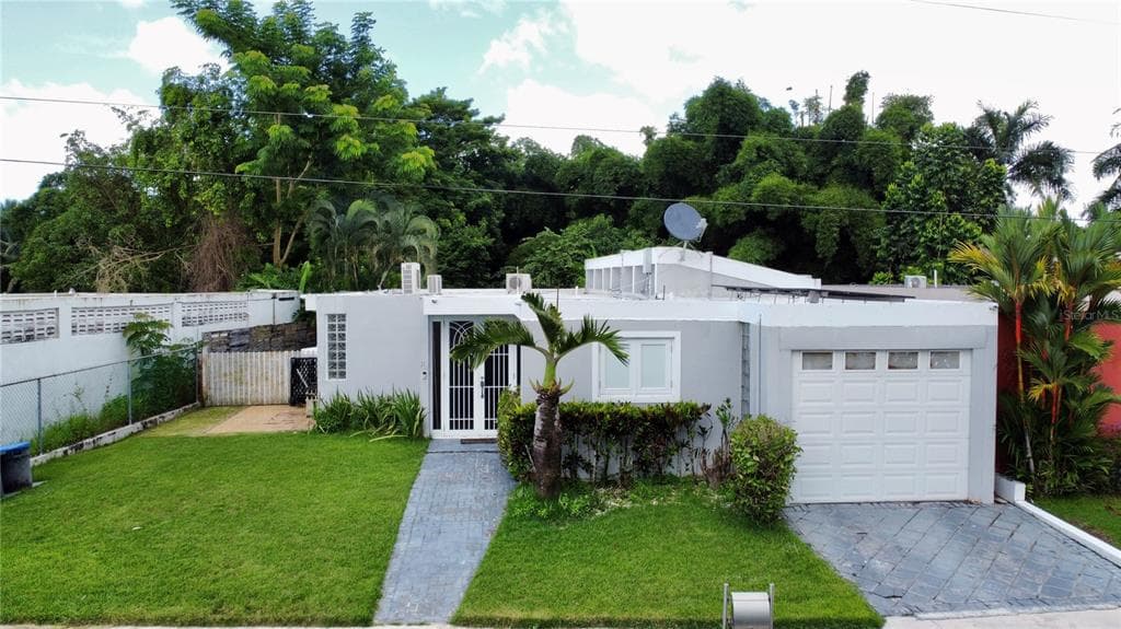 Exterior of Yunque residence shown by Compass