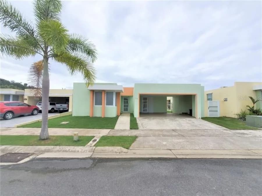 Exterior of 153 Aguacate residence shown by Compass