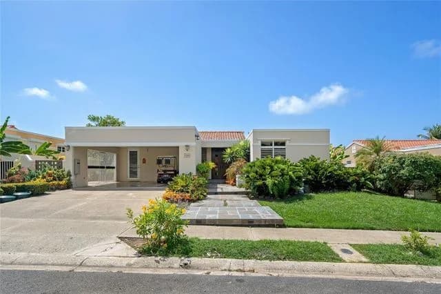 Exterior of 56 Calle Playera, Palmas Reales shown by Compass · Stellar MLS PR9100683
